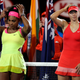Serena Williams and Maria Sharapova wait for the trophy presentation after the women’s singles final at the Australian Open tennis championship in Melbourne on Jan. 31, 2015.
